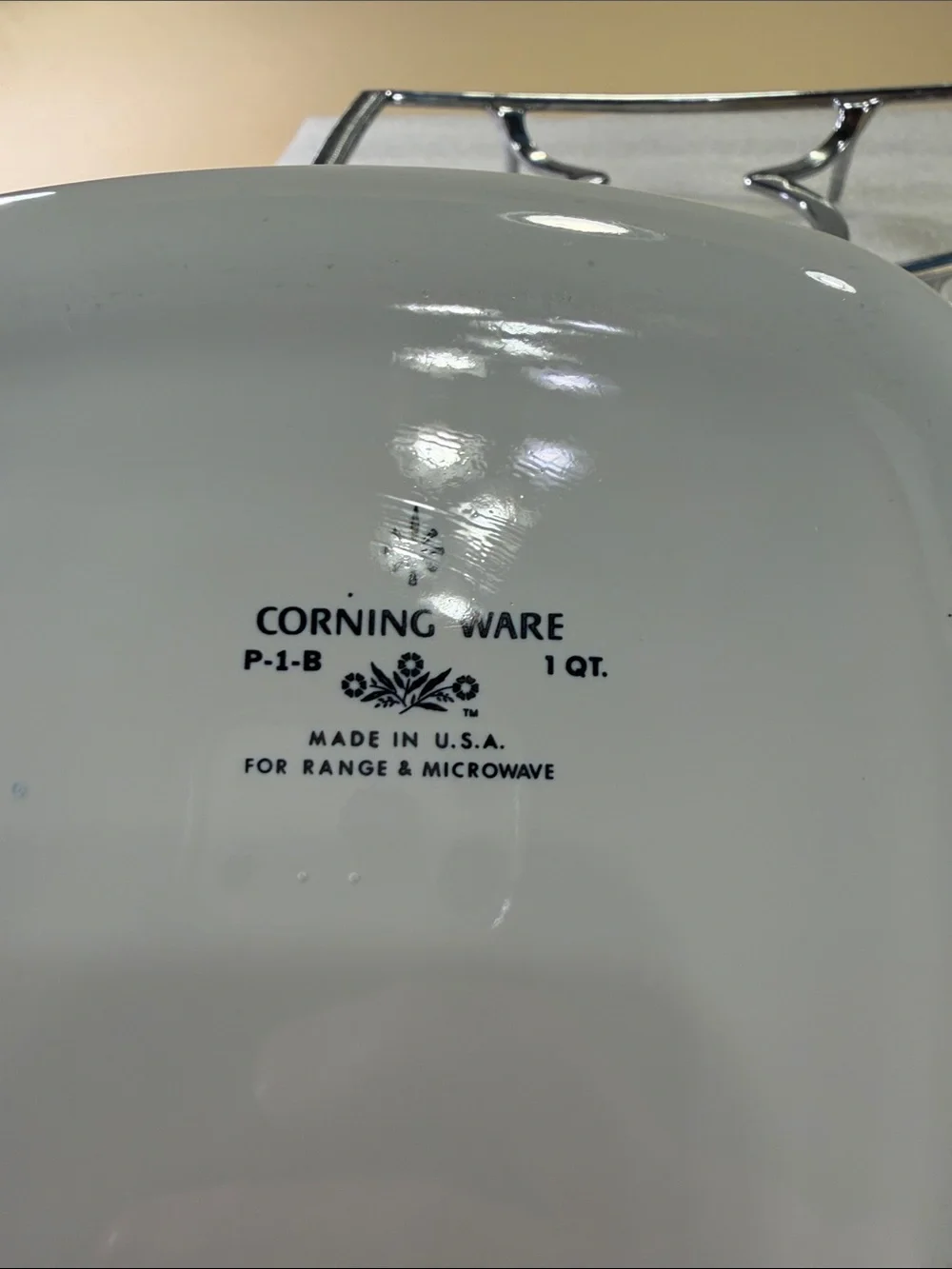Corning, ware casserole, dish, glass lid, and chrome trivet